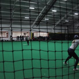 behind batter wide